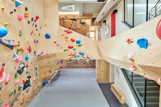The bouldering walls below the ground floor